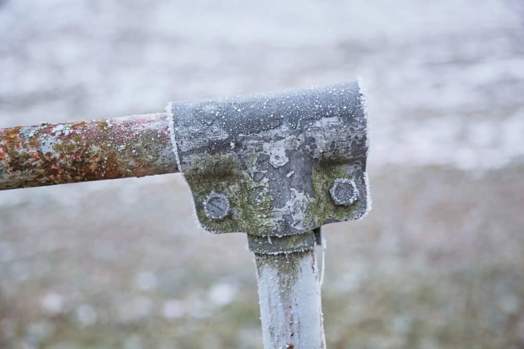 grey metal pipe with handle