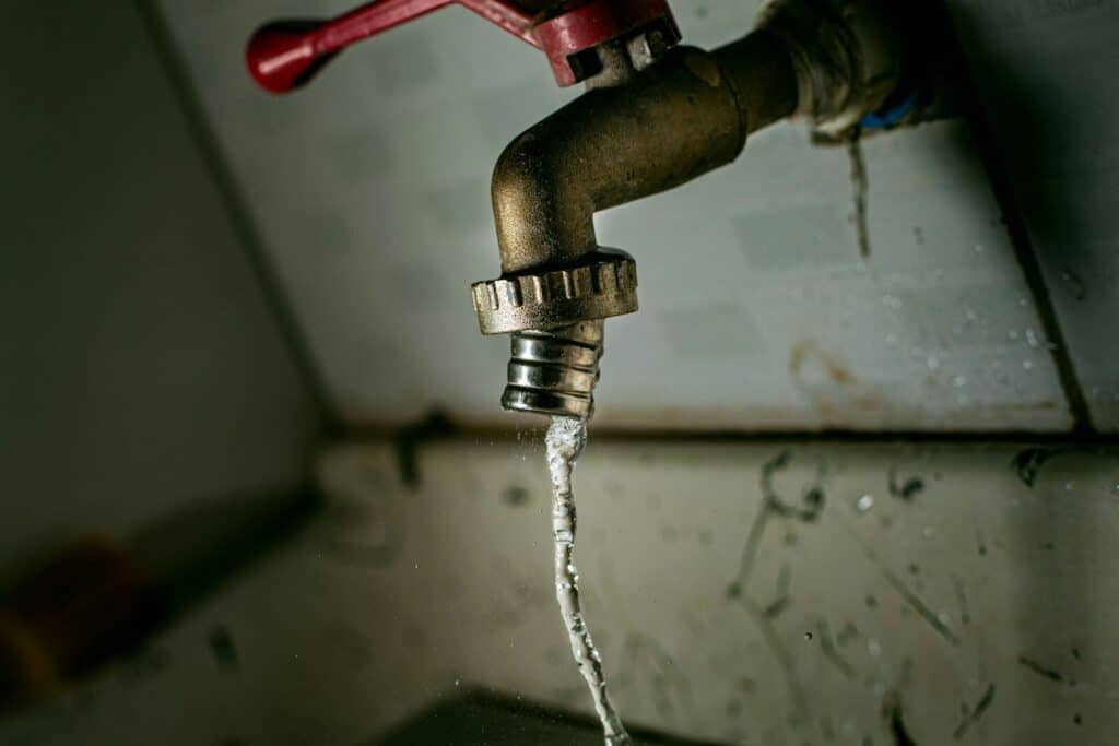 a water hose attached to a metal pipe Plumber in Glenarden, Maryland: Affordable, High-Quality Plumbing for Your Home