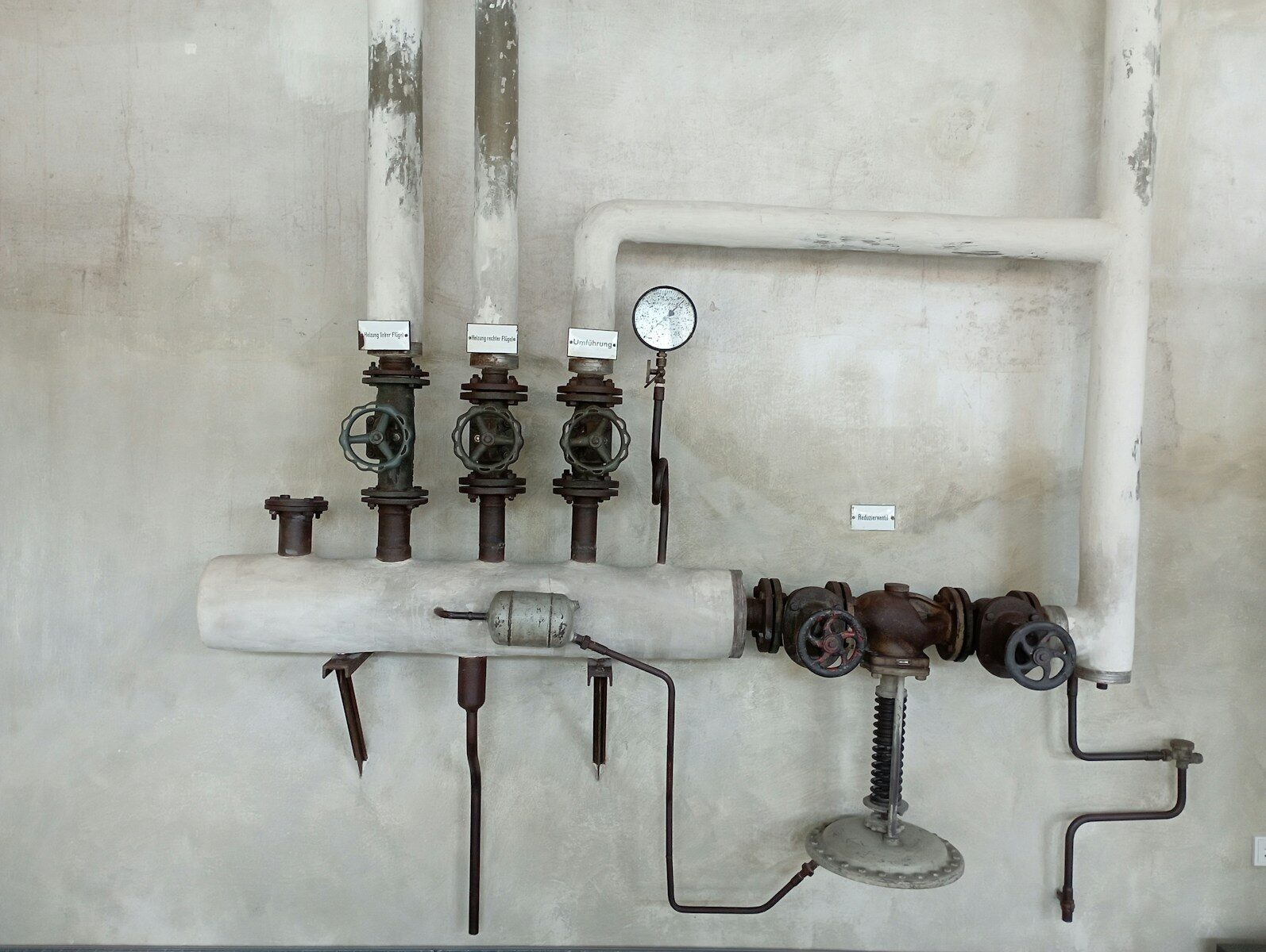 Photo by mehmet bicakci a machine with pipes Why Hiring a Commercial Plumber is Essential for Your Business And Your Wallet In The Long Run