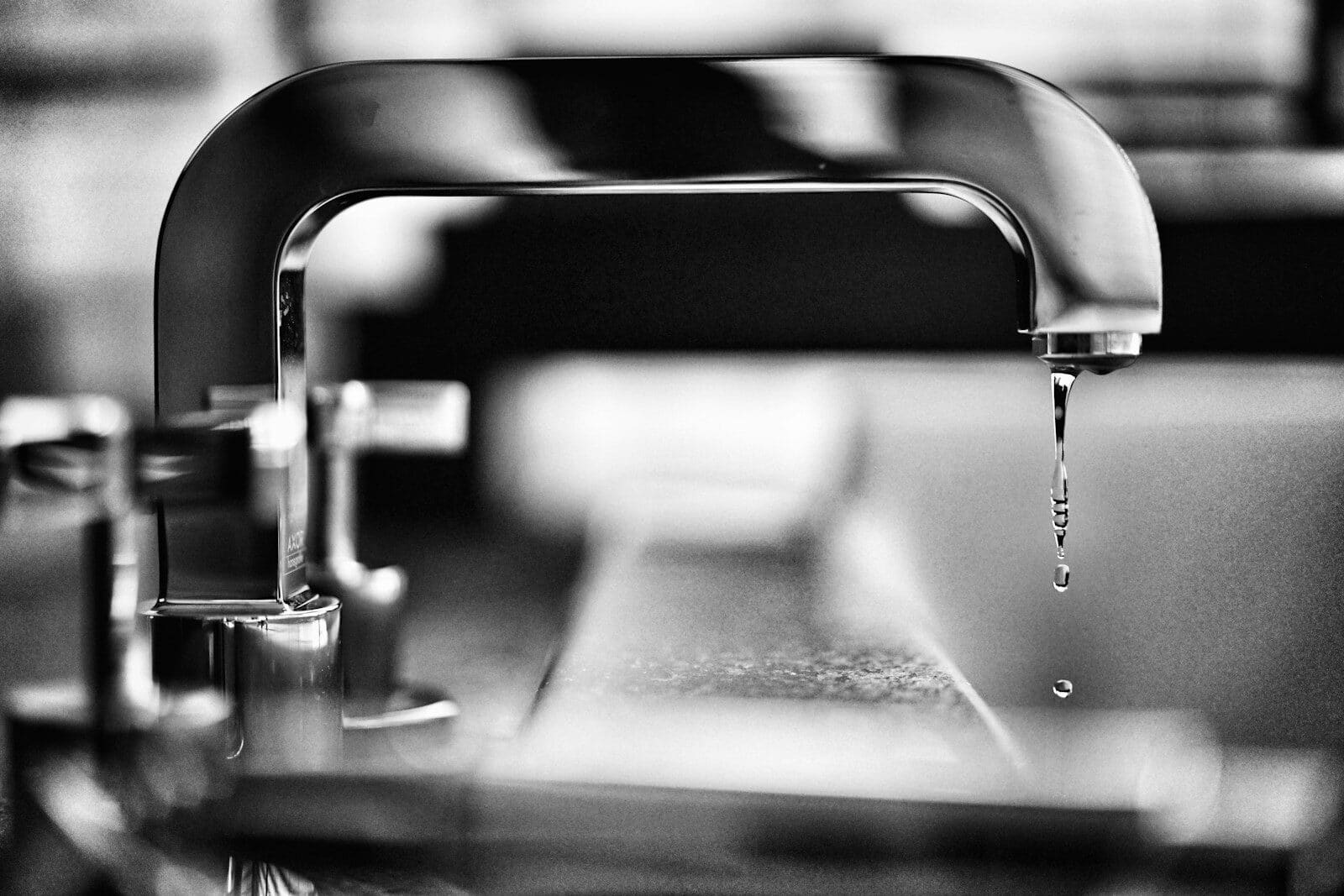 Photo by PAN XIAOZHEN grayscale photography of faucet Plumber in Upper Marlboro Maryland: Full-Service Plumbing for Local Homeowners